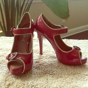 Red and cream patent pumps